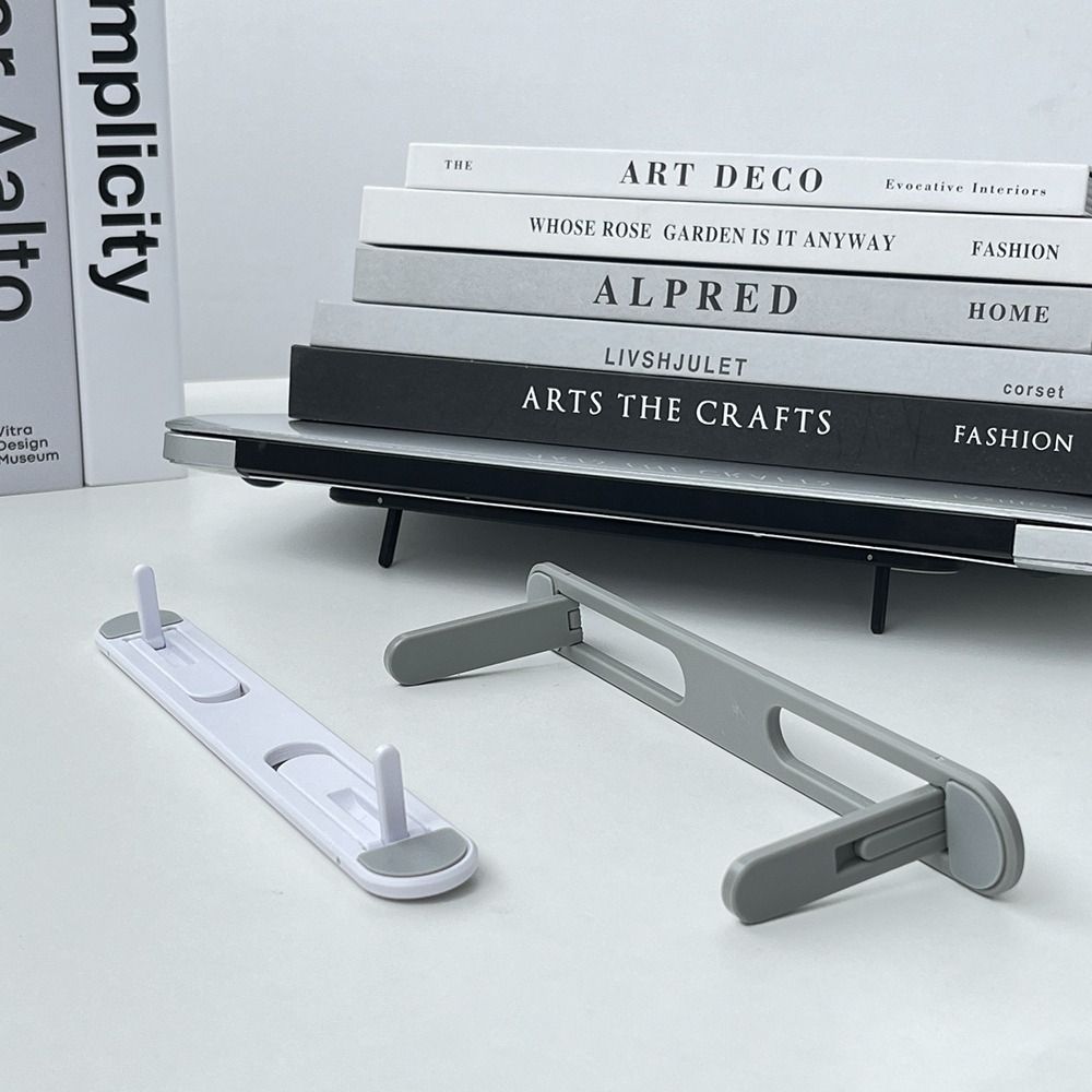 Laptop Stand Riser - ขาตั้งโน้ตบุ๊กแบบพับได้ ปรับระดับได้ มองไม่เห็นเมื่อใช้งาน ออกแบบตามหลักสรีรศาสตร์ มีหลายสี ใช้ได้ทั้งที่บ้านและที่ทำงาน
